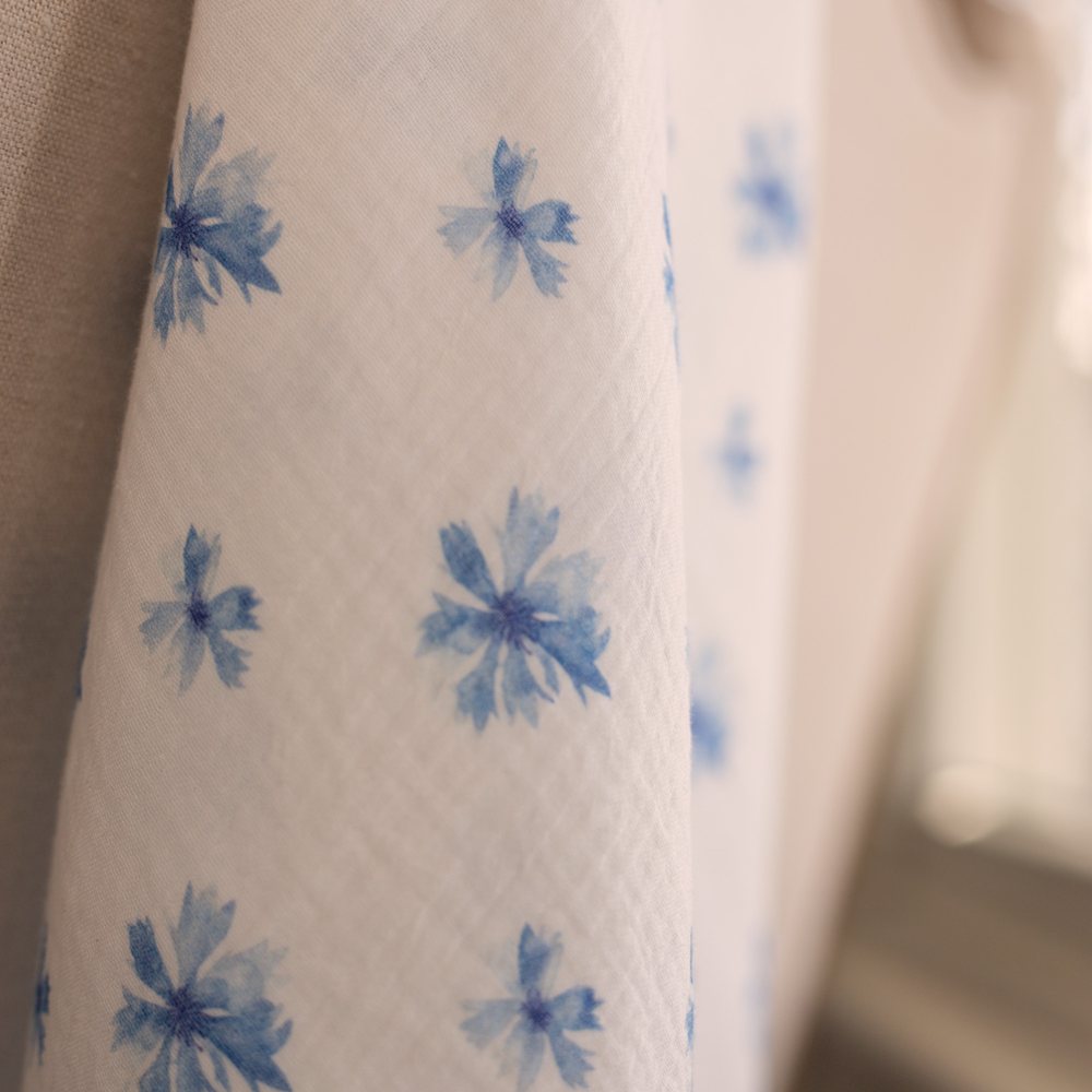 Cornflower muslin draped over a chair