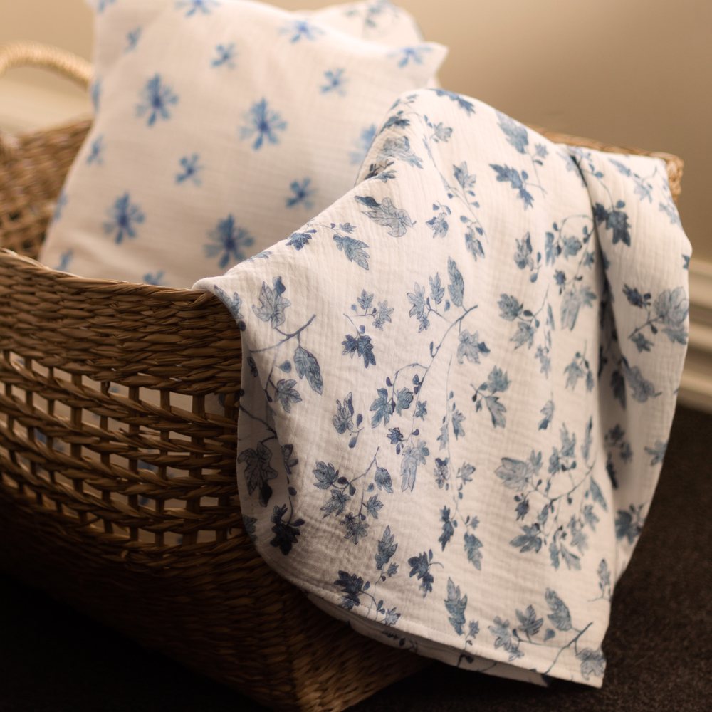 Fig and Cornflower muslin in a woven basket